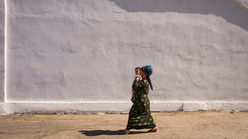 You don’t miss much driving, and looking out the window was a constant draw. Here, a woman in a traditional Turkem dress.