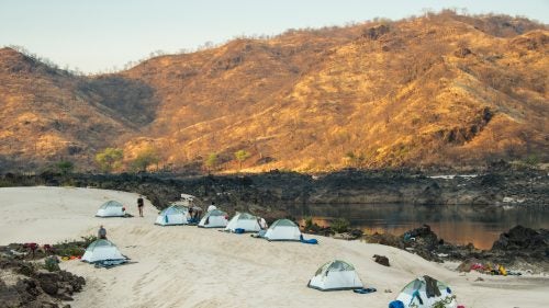 Second camp, Zambezi River, Zimbabwe. Although ROAM’s trips run as self-supported, leave-no-trace adventures, the camping is extremely comfortable—and include as many gin and tonics as you need to work off the pain of that day’s rafting.