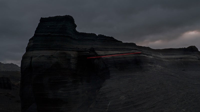By attaching thin pieces of string to the end of the electroluminescent wire and attaching it to a rock face or fixed point, many of the lights seem to be impossibly floating in the sky or diving deep into the water.