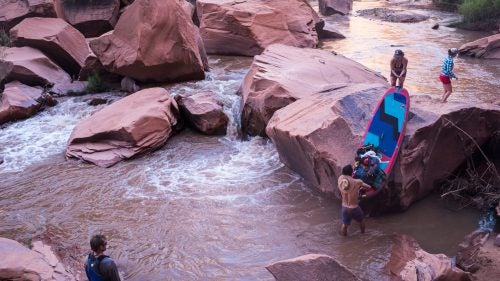 According to our map, there were at least two boulder jams that required scouting and possible portaging, but we ended up portaging more than twice. The mostly Class III river features miles of rocks and huge boulders, quick turns, and fast water.