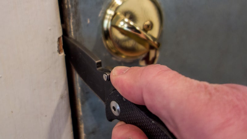 A knife will give you more leverage, more reach, and quicker access than whipping out a credit card ever will.