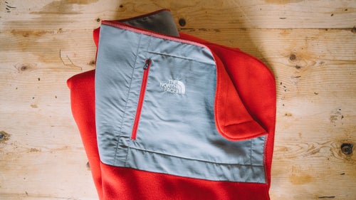 Stitched from the fabric left over from the North Face’s best-selling Denali jacket, this recycled polyester throw packs down into its own stuff sack for easy carrying.