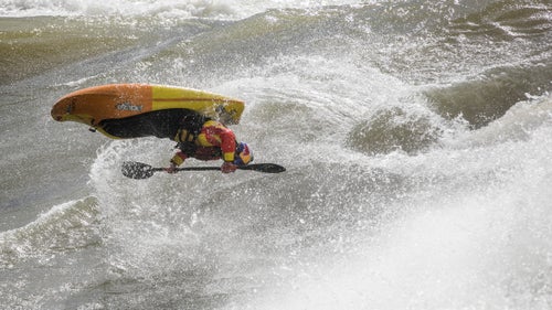 Freestyle whitewater kayaking is often associated with park-and-play: usually, you need car access. So when an international crew of whitewater aficionados loaded eight featherlight carbon freestyle kayaks onto rafts and paddled into the Canadian wilderness in September, they took the hunt for fresh waves to a new level.
The group, which included top paddlers like Ben Marr and Dane Jackson, drove for two days into the flatlands of central Canada in search of high flows, massive waves, and long air time in the province of Manitoba, which stretches north of Minnesota and North Dakota.
For years, professional kayaker and trip leader Joel Kowalski had his eye on this particular section of the Nelson River, which he thought could produce a sort of dream wave playground. A few days into the expedition, the group found what they were looking for: what they’d later deem the best river wave ever surfed. They set up camp for six days within sight of their raging, new-found playground. Here, photographer David Jackson, one of Outside’s 30 Under 30, shares his favorite frames from the trip.
Photo: Dane Jackson rotates during a huge airscrew surfing the Nelson River.