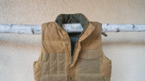 Filson Down Cruiser Vest ($375)
This vest has that classic Filson look—like it belongs on a Washington woodsman—thanks to an oiled-cotton outer. Inside, you get ethically sourced 550-fill European goose down.