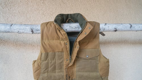 Filson Down Cruiser Vest ($375)
This vest has that classic Filson look—like it belongs on a Washington woodsman—thanks to an oiled-cotton outer. Inside, you get ethically sourced 550-fill European goose down.