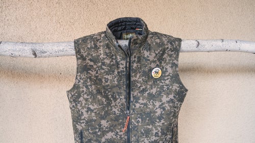 Howler Bros Camo Merlin Vest ($135)
Made for when you need to blend in (or stand out), the camo Merlin vest is packed with Primaloft insulation that works well over a T-shirt or under a shell.