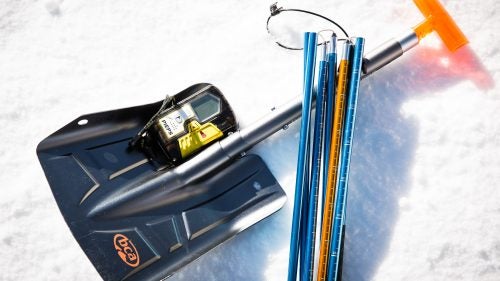 Snow Safety Gear
McElroy carries her snow safety gear—a BCA SR3 probe, Pieps DSP Pro beacon, and BCA B-2 EXT shovel—at all times. These items are issued to Squaw patrollers, but they’re also the ones she recommends. McElroy says backcountry skiers often make the mistake of getting the lightest items available, but she’d rather have the longest probe and sturdiest shovel, regardless of weight. While she doesn’t think it’s necessary for inbounds resort skiers to carry all three, she highly recommends wearing a beacon on days when the resort is doing avalanche control. If a slide is reported in an area where there are skiers, the first thing McElroy and her fellow patrollers do is perform a beacon search on the slide debris.