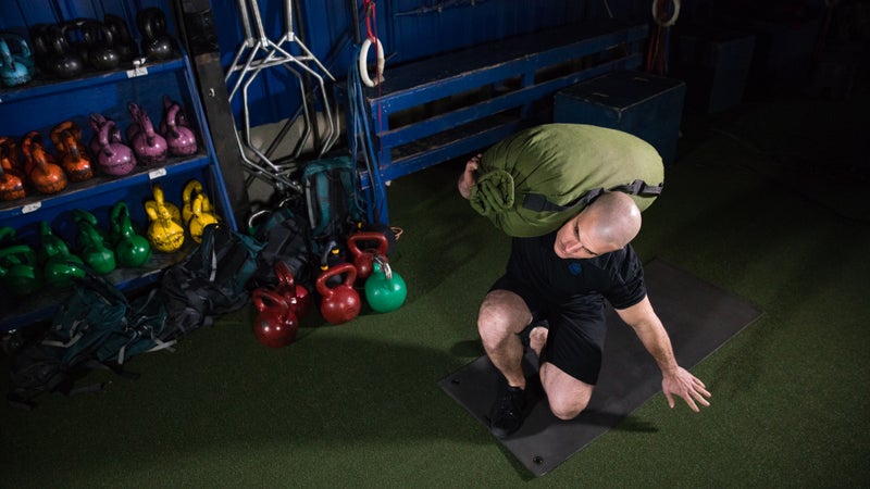 Bausman demonstrates a total body core routine at the Mountain Tactical Institute in Jackson, Wyoming.