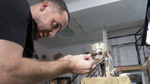 Key designer John Nolan constructs Spy Wild Dog Pup at his studio in a North London suburb, where Buckbeak the Hippogriff from the Harry Potter films was also created. These animatronics are engineered at the intersection of biology, zoology, robotics, and art, to ensure that the spy creatures are as life-like as possible. The team could make the spies move through remote control, and each spy was also equipped with infrared sensors that triggered movement if another animal came near.