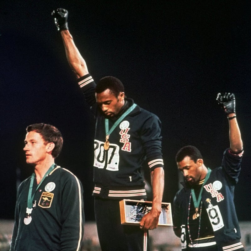 Tommie Smith, John Carlos, and Peter Norman on the podium for the 200-meter medal ceremony.