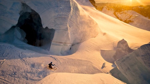 Out the backcountry gate, Mount Baker has incredible crevasses and similarly prodigious snow. Here, my brother Josh Hummel skis past a giant hole in an ice wall on Coleman Glacier in Mount Baker Wilderness, Washington.