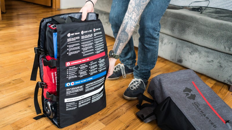 This organizer sleeve slides into the waterproof pack body, and can also be carried as a standalone backpack.