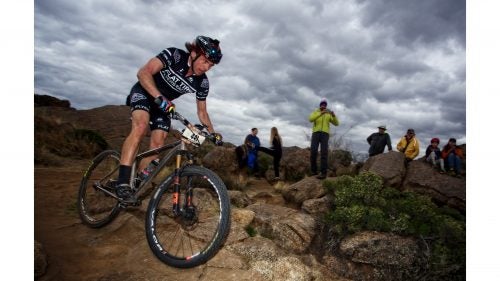 Dax Massey, of Denver, Colorado, rides before the storm for team Roca Roja Rollers. He finished with a fast lap time of 01:01:36.