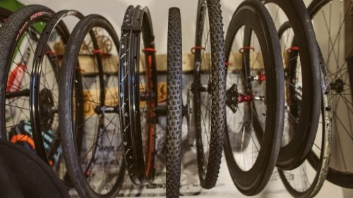 Baddick built his own wheel rack to keep all the hoops organized and out of the way.
