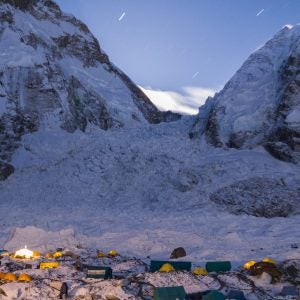 Headlamps weave through the basecamp at Mount Everest.