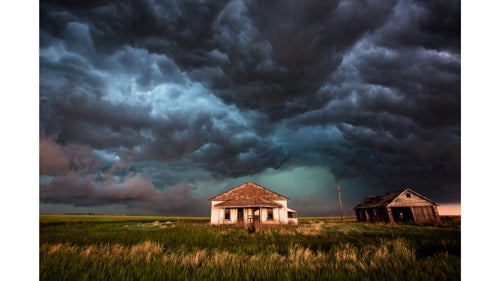 Stunning light illuminates this farmhouse and field, creating amazing colors after a shelf cloud moved over my position leaving rolling clouds that almost looked like the underbelly of an ocean wave.