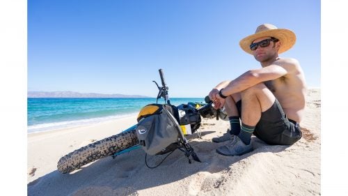 Carr soaks up the morning sun after a sunrise mission to ride the beach about 16 miles from La Ventana to Bahía de Los Muertos. After almost ten miles of beach riding on the eastern coast, we stopped here for breakfast and to enjoy the incredible views and tranquility. The beach had become impassable due to variable conditions, so after a quick cold coffee and makeshift quesadilla, we set our sights on Los Barriles, 34 miles to the south.