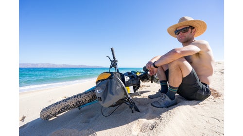 Carr soaks up the morning sun after a sunrise mission to ride the beach about 16 miles from La Ventana to Bahía de Los Muertos. After almost ten miles of beach riding on the eastern coast, we stopped here for breakfast and to enjoy the incredible views and tranquility. The beach had become impassable due to variable conditions, so after a quick cold coffee and makeshift quesadilla, we set our sights on Los Barriles, 34 miles to the south.
