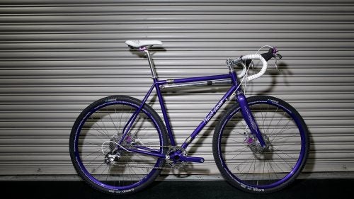 This Prince tribute bicycle from Peacock Groove Bicycles in Minneapolis, Minnesota, has too many custom touches to list, but here are some of the highlights: a custom purple Prince paint job, waterjet-cut H2O reinforcements, S&S couplers, asymmetrical chainstays, custom rotors, and, embedded in the stem, a pick that Prince used. “I’ve had multiple people cry when they see the bike for the first time,” says designer Erik Noren.