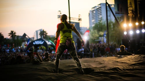 Alejandra Contreras Pérez pumps up the crowd before taking on an intermediate route in the finals. She completed the route within her time limit, and ultimately took fourth place overall in the women's competition.