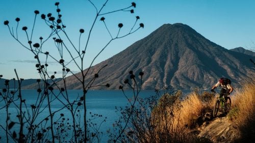 Eric Porter rides above Lake Atitlán, which is surrounded by 33 volcanoes, including three that are currently active.