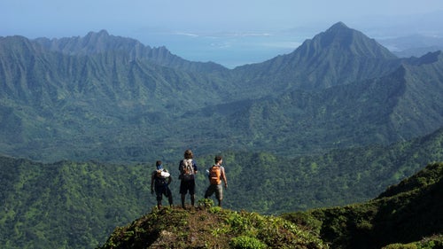 Beyond Oahu’s well-known destinations is the Ko’olau Mountain Range, remnants of the extinct shield volcano that once helped to form the island’s land mass.
Exploration of these mountains isn’t new, but it wasn’t until five years ago that the first traverse of the entire range was completed, by Chase Norton, then a PhD student at the University of Hawai’i. (The length of the traverse is unclear. Estimates range between 55 and 80 miles.) Norton spent years working out logistics, locating water sources, and attempting the route multiple times before completing it in eight days in April 2012, using a mix of mountaineering, climbing, route finding, and bushwhacking.
For about two years, Norton remained the only person to successfully complete this feat. Then, in January 2014, photographer-filmmaker Ryan Moss completed the route in five and a half days. After Moss’ successful trek, the route saw numerous attempts but fewer than a handful of completions over the next few years.
On March 4, 2017, Moss set out to beat his own speed record and succeeded spectacularly, completing the trek solo and unassisted in just four days and seven hours. Just a couple weeks after Moss’ successful traverse, Derek Potter, a Pearl Harbor–based machinist in the U.S. Navy, impressively completed the trek on his first attempt in just three and a half days.
The following images were captured over the course of the past five years as part of a project to document the Ko’olau Range.