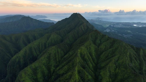 The Ko’olau Range isn’t known for towering peaks or vast, open spaces, but rather for the complexity and diversity of its terrain. Pictured here is the tallest point in the range, Pu’u Konahuanui, which stands at 3,105 feet and is commonly referred to as K1.