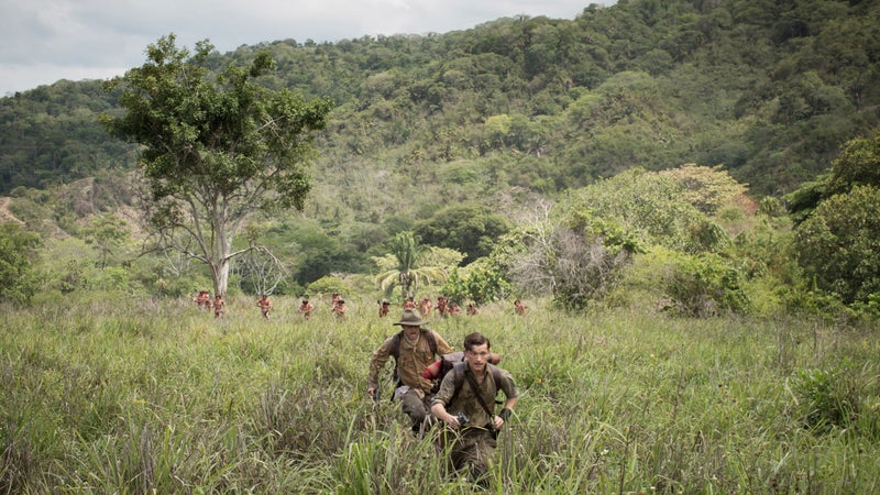 Tom Holland (center, left) stars as Jack Fawcett and Charlie Hunnam (center, right) stars as Percy Fawcett