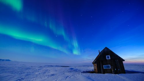 As the sun goes down in the Arctic, the real show begins. Here, the Northern Lights exploded in the sky as we took shelter for the night.