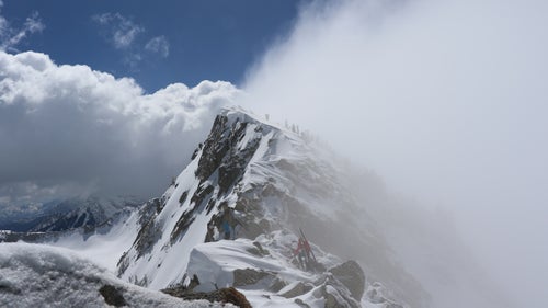 Changing weather on Thunder Ridge, near the summit of North Thunder Peak, en route to ski the Dresden Face and the Hypodermic Needle.