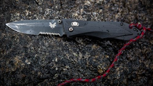 This Benchmade Ares Axis knife (now discontinued) has lived on Smith’s radio harness every day for more than ten years. He uses the straight edge to open medical packages and prepare food. The serrated edge is essential for cutting ropes and webbing at climbing anchors. The lanyard attaches to his vest and ensures the knife doesn’t fall off when he’s hanging below a helicopter.