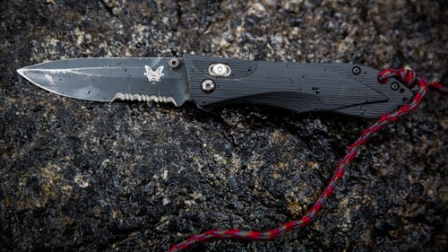 This Benchmade Ares Axis knife (now discontinued) has lived on Smith’s radio harness every day for more than ten years. He uses the straight edge to open medical packages and prepare food. The serrated edge is essential for cutting ropes and webbing at climbing anchors. The lanyard attaches to his vest and ensures the knife doesn’t fall off when he’s hanging below a helicopter.