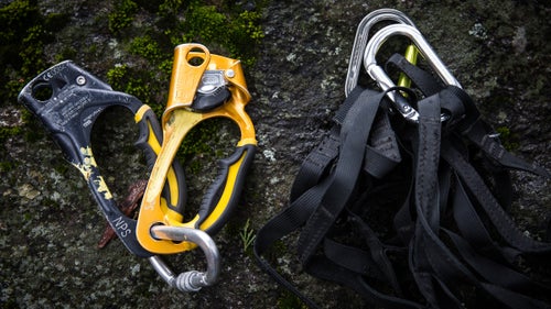 It’s not uncommon for Smith to ascend 1,000 or more feet of fixed ropes to reach the site of an accident, so he always carries Petzl’s Ascension rope clamp (left, in black and yellow), combined with lightweight aiders like Yates’s. The Ascension is the gold standard among climbers: Smith credits the ergonomic, easy-to-use lever for its popularity. Yates’s 3/4-inch aiders are much lighter and take up less space in a pack than the typical big-wall varitty. While not great for actual aid climbing, they’re perfect for ascending ropes and moving around during a technical rescue.