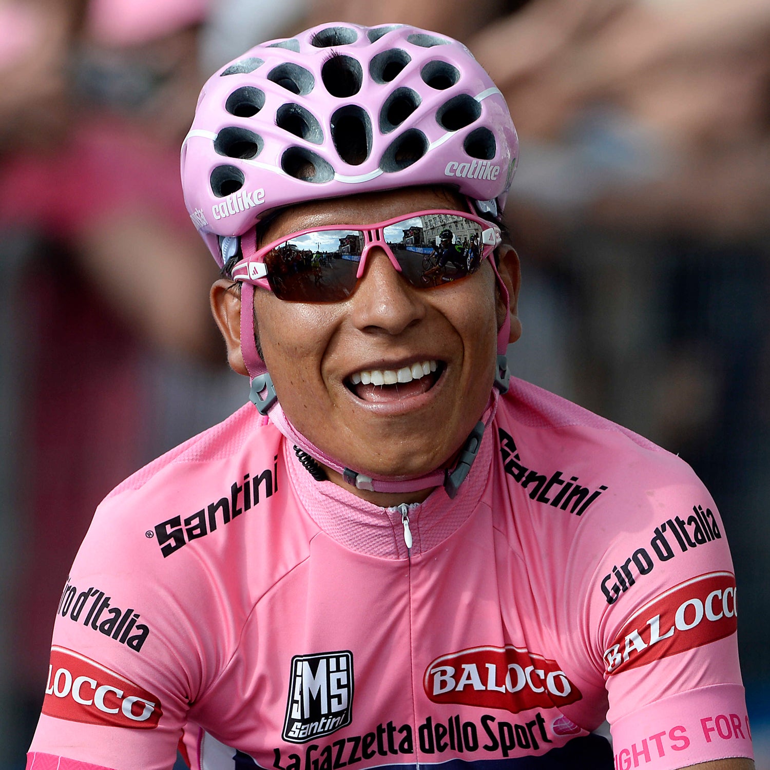 Colombia's Nairo Quintana, wearing the pink jersey of the overall leader smiles on his way to win the 2014 Giro D'Italia, Tour of Italy.