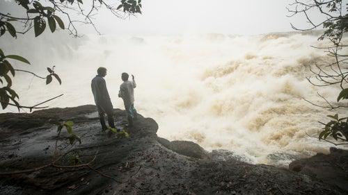 Jules Domine (left) chats with a local fisherman on April 20, minutes before a FARC guard arrived to detain the kayakers. The guard told them to gather all of their stuff and come to a FARC camp a few miles away. “We didn’t really have a choice in the matter,” Stookesberry says. “We told them we didn’t want to come with them, but if it was necessary and it was something that would end quickly, then we would happily do it.”
The guard brought the kayakers to the camp on the banks of the river and told them not to use any electronics.
However, Stookesberry discretely used his Garmin InReach satellite communicator to text his friend, Taylor Robertson, as well as a local Colombian contact, who had contact with a private security company as well as government officials in Colombia and the U.S. Stookesberry told Robertson to wait at least 24 hours before contacting any government agencies, hoping that the situation would resolve itself.