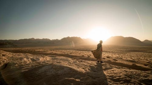 Sunset in the desert, where the fine red sand felt almost like velvet.