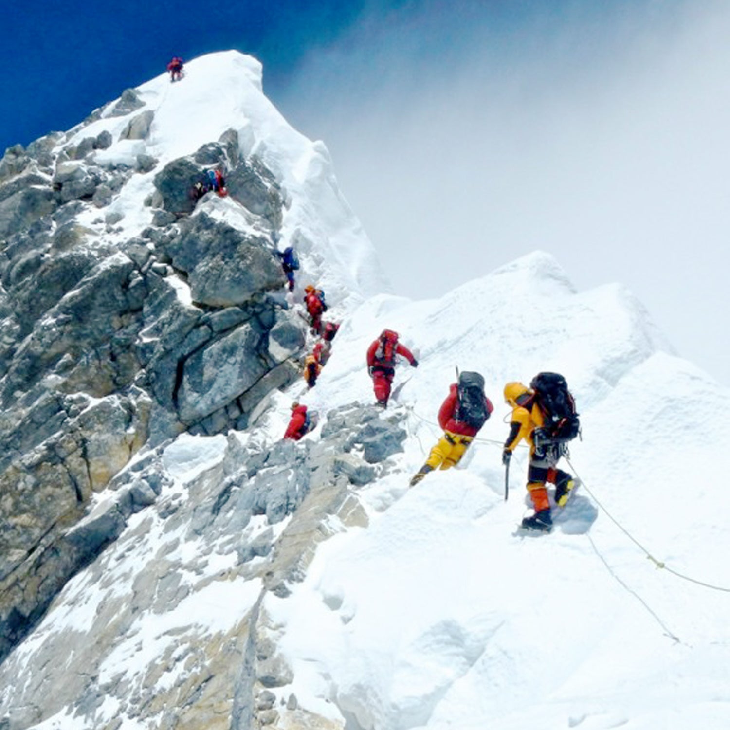 Climbers ascend the Hillary Step.