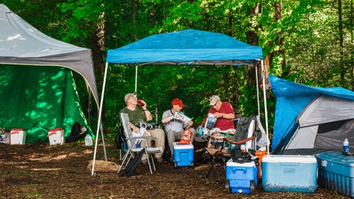 Frank Masters, aka Sunset, is one of only a handful of people who can boast a double triple crown—hikers who have completed thru-hikes of the Appalachian, Pacific Crest and Continental Divide trails, not just once, but twice. He and three-person crew (pictured here without Masters) spend most of the festival holding court at Camp Sunset. This year, the four men celebrated their 69 birthdays and the fact that they all graduated college together in 1969.