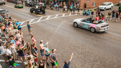 Local residents look on as Miss Trail Days 2017, Morgan Wolf, along with 2016 Teen Miss Trail Days Ally Manuel, Young Miss Trail Days Audra Larson and Junior Miss Trail Days Kendra Harding lead the annual parade. (Not pictured: Petite Miss Trail Days, Mini Miss Trail Days, and Toddler Miss Trail Days.) For 20 years, the pageant was a defining event for the town of Damascus but was canceled this year due to low contestant entries.