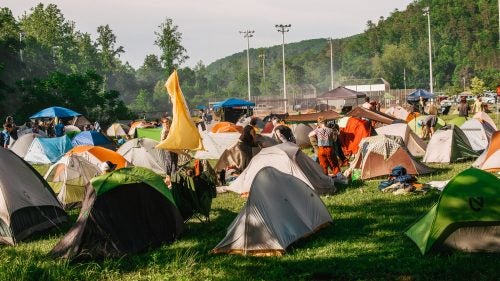 Free love, drum circles, and shared psychedelics make a comeback once a year at Tent City, where hikers set up camp. This year, after three days of deluging rain, the field (which serves as the town’s baseball diamond and grass parking area most of the year) rivaled those of Woodstock for sheer volume of mud and soggy people. During a brief break in the storms, one thru-hiker is caught turning over her tent in an attempt to drain out the water.