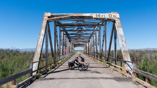 I’ve ridden and loved bikes for 35 years, raced since I was ten, and idolized the greats like Greg Lemond, Bernard Hinault, and Andy Hampston. Cycling is in my blood, and to me it always meant two wheels—until now.
Sixteen months ago, I broke my arm. Everyone said it was a minor break, but the injury festered. The pain worsened, and doctors shook their heads. And then, almost a year to the day, I rebroke it trail running. I started going crazy: I couldn’t ride a regular bike, nor I could I run, do yoga, hunt, or fly-fish.
Then one day, in a moment of frustration, I started looking for recumbent, three-wheeled bikes that could handle dirt. For “serious” cyclists, a recumbent, or trike, is about as appealing as training wheels. I’d never considered riding one, but soon found the Terra Trike Rambler All-Terrain, a brand-new design that landed on my doorstep a few weeks later. And though I hadn’t ridden it yet, and though I’d been couch-bound, and though I had only a week until I left for a photography assignment in Jordan, I concocted a trikepacking tour of the backroads of New Mexico. Four days, three nights, and several hundred miles later, I was sold.
The Rambler takes all the good parts about cycling and leaves out the bad. (More on that below.) Just off the couch and on a two-wheel bike, I would never have been able to log as much time as I did and see so much country. The Rambler, however, gave me the freedom to get out and enjoy what I love. Which is why, though I’ll never completely divorce my bicycle, I foresee a lasting affair with the trike.