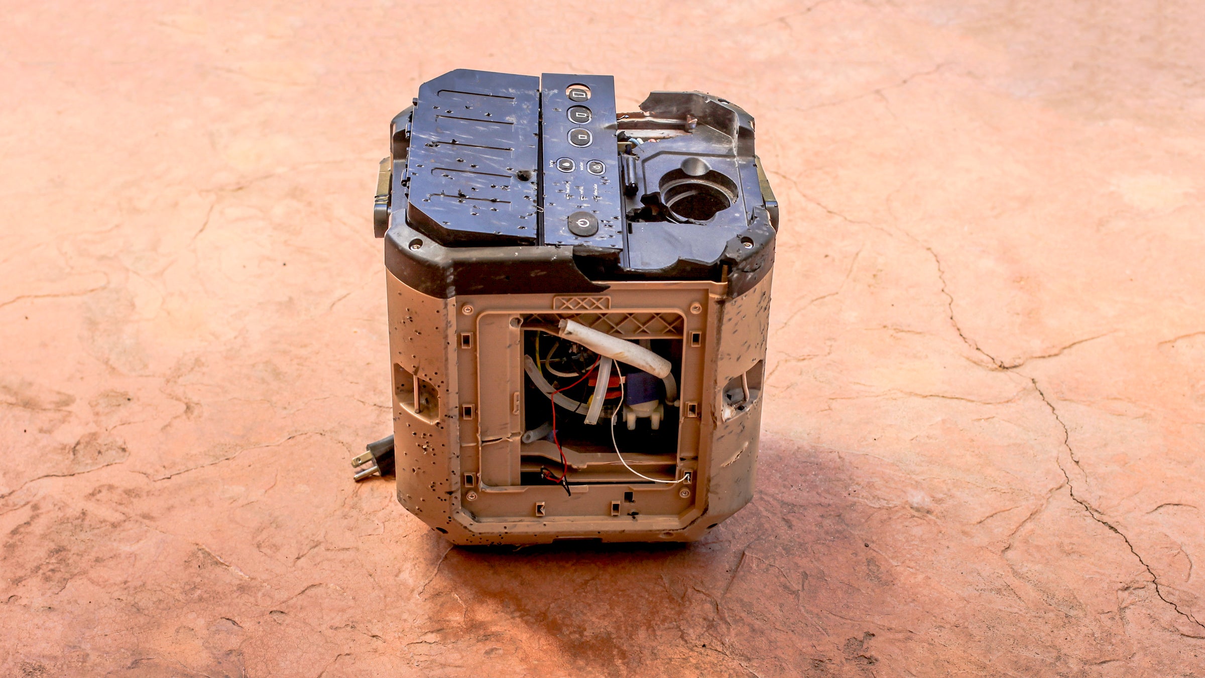 We tried everything, and it took a shotgun to kill this coffee maker.