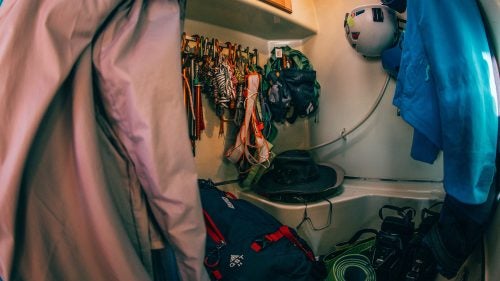 “I didn’t want to deal with a septic system, so I changed my ‘wet bath’ to a ‘wet-gear room.’ It holds all my climbing gear, mountaineering gear, canyoneering gear, outerwear, tents, backpacks, ice axes, yoga mats, and laundry.”