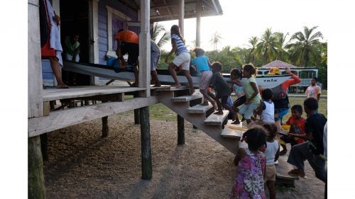 Multiple local children helped with our boats in the coastal town of Haulover. This day, we arrived to town, and a couple insisted we stay in their entire house for accommodations, as they slept in the house next door with their extended family. We begged for permission to just camp in the yard, but they refused. In the days that followed, we formed a friendship. The family took us sailing and fishing in a dugout canoe, served us turtle, and we enjoyed many conversations with their lobster-diving son.