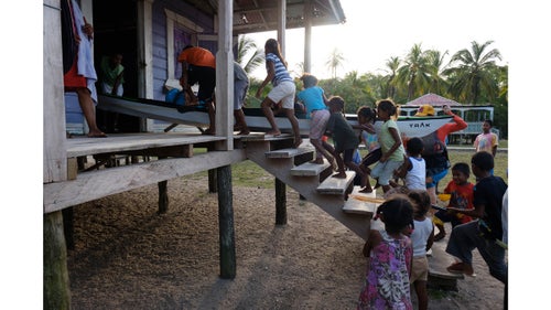 Multiple local children helped with our boats in the coastal town of Haulover. This day, we arrived to town, and a couple insisted we stay in their entire house for accommodations, as they slept in the house next door with their extended family. We begged for permission to just camp in the yard, but they refused. In the days that followed, we formed a friendship. The family took us sailing and fishing in a dugout canoe, served us turtle, and we enjoyed many conversations with their lobster-diving son.