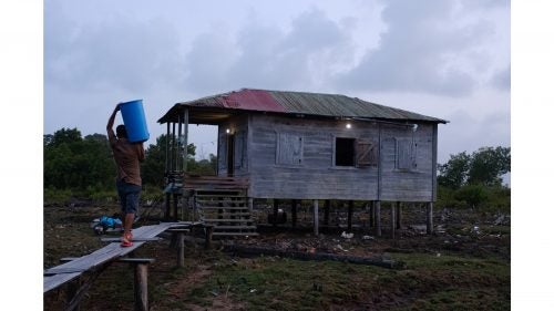We quickly learned that living in the backwaters requires extensive effort to obtain fresh drinking water. This particular man paddled his dugout canoe across a lagoon each morning before sunrise, to access a spring for his daily supply.
