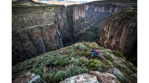 In April 2017, I joined mountain bikers Kevin Landry and Claudio Caluori to ride and photograph a six-day, 120-mile traverse through the landlocked country of Lesotho, in South Africa. Our trip was put together by the organizers of the Lesotho Sky mountain bike race, who are trying give the country a tourism bump by highlighting its riding. They have an easy case to make. Beginning at the 630-foot high Maletsunyane Waterfall in the middle of the country, we found top-notch mountain biking between 10,000-foot peaks, along wild valleys, and through countless remote towns. Photo: Lesotho is a poor nation and heavily reliant on its encircling neighbor, South Africa, for economic progress. Even the 100-rider Lesotho Sky race, which started in 2011 and is taking place again this fall, is hindered by the country’s lack of infrastructure. That said, the rugged beauty of Lesotho’s landscapes will turn heads—though the exposure on many of its trails meant that wasn’t a possibility while riding.