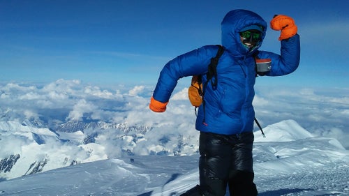 When she got to the summit ridge at 20,100 feet, she tried to pull ice off her nose. “Then I realized it wasn’t ice that had frozen on my nose,” she says. “It was my nose.” She walked along the summit ridge to the summit, which took half an hour, reaching the top of the mountain in 14 hours, 45 minutes. “When I got there, I only had enough energy to make a funny pose for the camera,” she says.