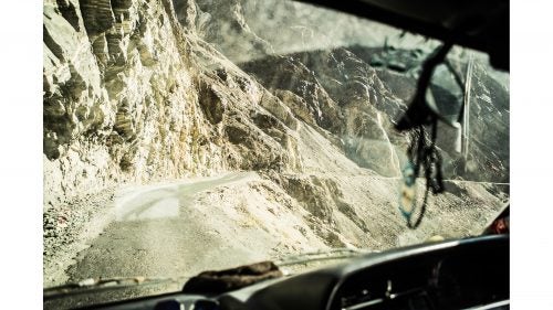 The roads in northern Pakistan are infamous for good reason: massive exposure, poor upkeep, and rarely wide enough for all four wheels. While we were navigating the river, our guides were experiencing similar struggles high up the canyon walls.