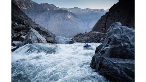The sun disappears behind the gigantic ridgelines of the Indus as paddler Aniol Serrasolses sends one final rapid. In search of the right flows that would allow us to pass all the way through the gorge, we were on the river in December, with winter flows around 20,000 cubic feet per second (cfs). The river can expand to 700,000 cfs with snowmelt in the spring.